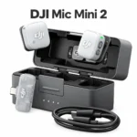 DJI Mic Mini 2 kit with two silver-white transmitters, USB-C receiver, open dark grey charging case and cable on a white background