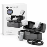 DJI Mic Mini 2 retail box beside two silver-white transmitters, USB-C receiver, open charging case and cable on a white background